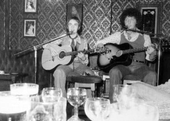 Simon Foley, 18 (son of the Vicar of Leeds) and Dave Robson, 18 who call themselves Tobias, entertaining in the Wakefield Pride pub on the corner of Kirkgate - which has most recently been in business at the Wakey Tavern - in 1976.