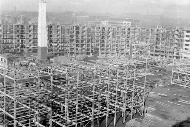 A mesh of steel framework with refuse centre chimney in the centre in October 1938.