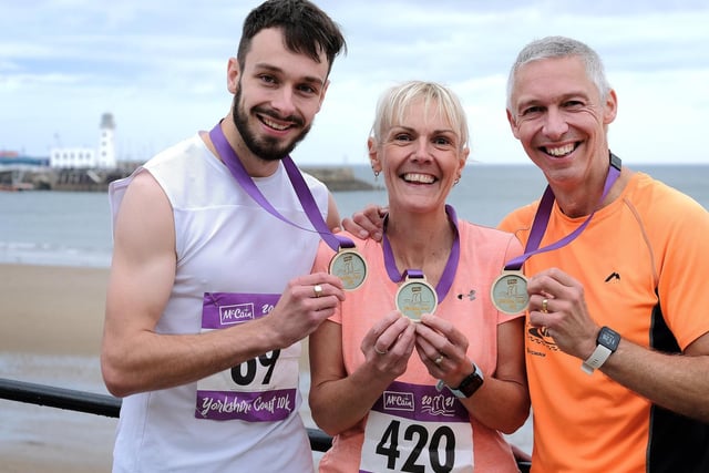 Dan Maw, left, with his mum, Claire Maw, and dad, Rich Maw, after the trio completed the 


Photo by Richard Ponter