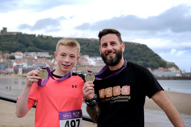 Charlie and Steve Flintoft with their medals after the 10k

Photo by Richard Ponter