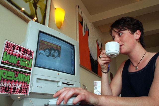 Bronwen ap Harri sends postcards via the Internet at the Planet Connect Cyber Cafe on Cross Belgrave Street in June 1996.