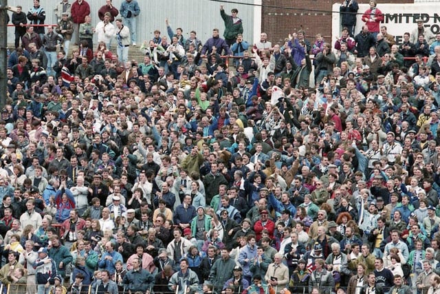 PNE fans celebrate North End's win at Bloomfield Road in October 1992