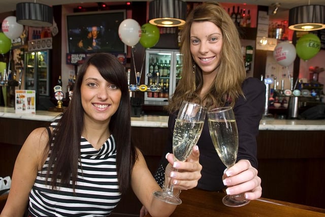 Yate's Wine Lodge general manager, Ranya Bodjaja and deputy manager Hayley Gallacher celebrate thier Best Bar None Award in 2010