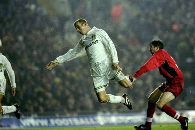 Lee Bowyer rises high to head home.