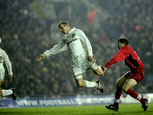 Lee Bowyer rises high to head home.