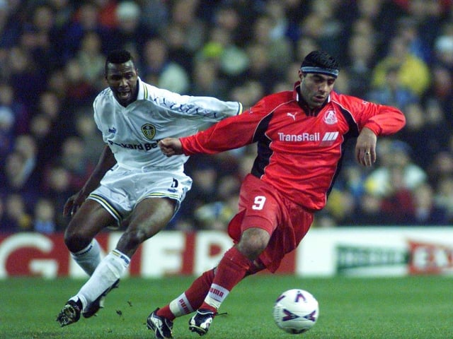 Lucas Radebe chases down a Lokomotiv striker.