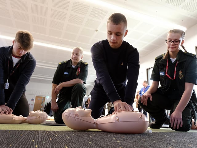 George Allison and Dominik Kycznir work with NHS staff Lynsey Snowden and Lydia Hunt.