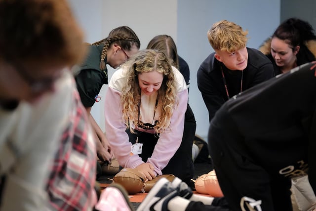 Students have a go at the CPR practical work.