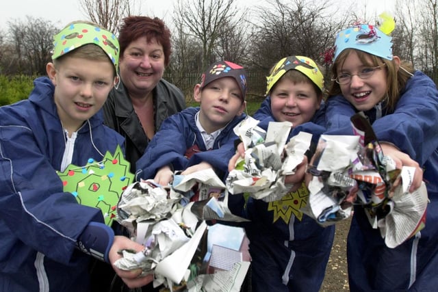 Hugh Gaitskell Primary School pupils dressed as recycling warriors for the launch of Community Pride, a litter picking initiative. Pictured with Coun Angela Gabriel are  , from left, James Mann, Joe Kelly, Tom Leak and Emily Jackson.