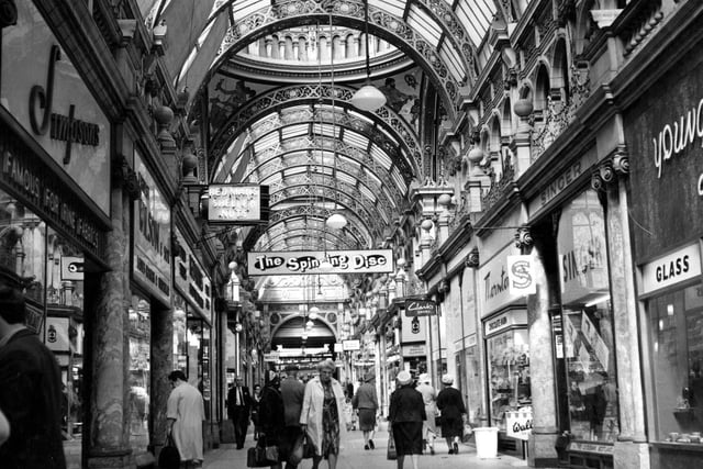 Shops visible in the County Arcade circa 1967 include Thornton's chocolates and Simpson's fabrics.
