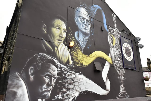 Marcelo Bielsa, Don Revie and Howard Wilkinson have been immortalised on the side of the Yorkshire Rose Pub in Guiseley - the three managers to help Leeds earn promotion in the club's history.