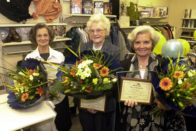 Help The Aged volunteers are presented with years of service awards at the Street Lane shop in Roundhay. Pictured, from left, are Alison Pearson, Joan Dalley and Marie Barnes.