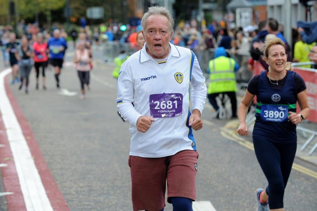 A Leeds United fan keeps up the pace