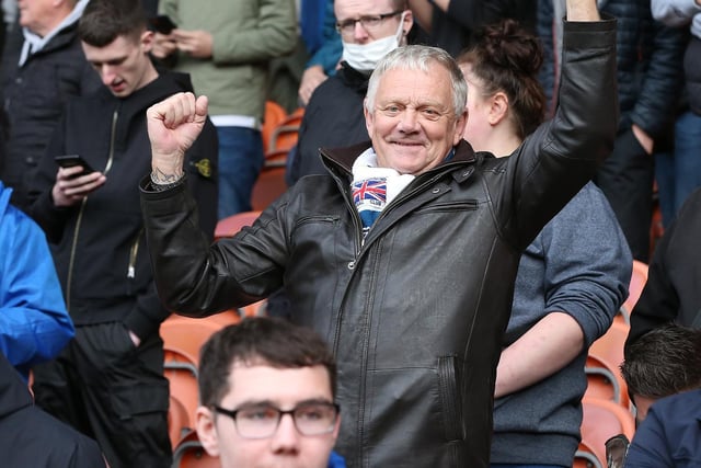 A North End fan in the away section at Bloomfield Road