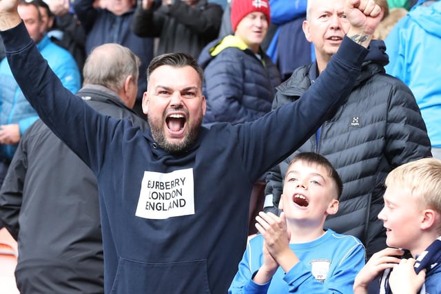A North End fan shows his support at the derby clash