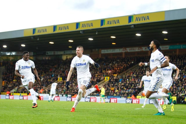 Jansson celebrates by launching himself into the travelling crowd as Whites supporters go mad.