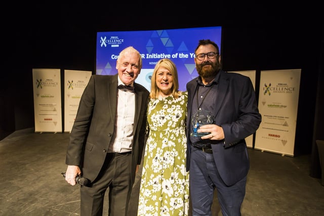 Company CSR Initiative of the Year Award. From the left, Host Harry Gration, Christine Armstrong from Wakefield BID and Craig Higgins from winners The Ridings Centre.