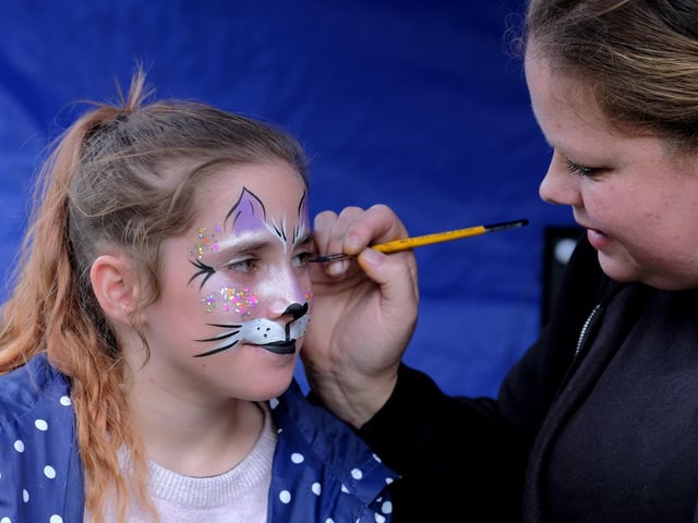 Ruby goes for cat look as Jenny of Fantasy Faces puts in the finishing touches.