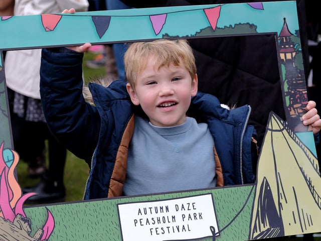 Arthur poses for a snap with the photo frame.