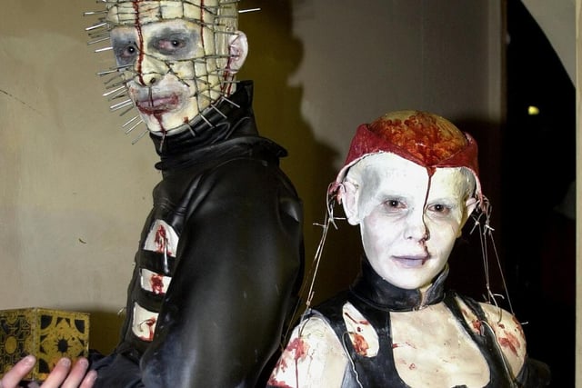 Lee Ingham as a character from Hellraiser and Julie Hardaker  get ready for Halloween at Jellies nightclub Blackpool, 2000