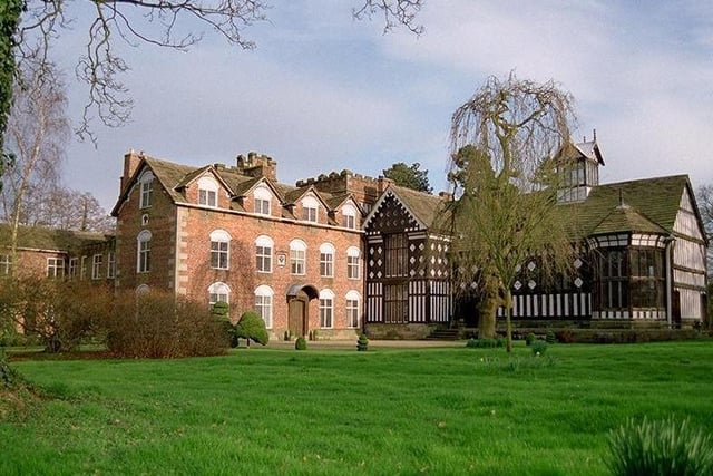 The hall is reputedly haunted by a grey lady, Queen Elizabeth I and a man in Elizabethan clothing. The figure of a man floating above the canal at the rear of the building has also been reported.