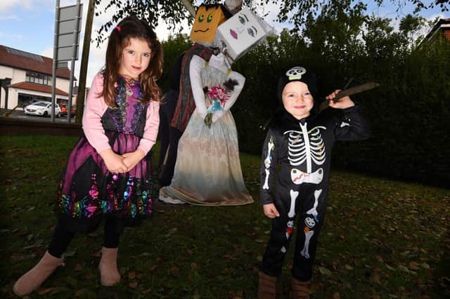 Jessica, six, and James, three, get into the spirit of the event, doing the trail in Halloween outfits.