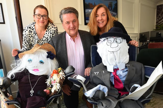 from left, Julia Watt, Peter Pearson and Nicola Lucey with their scarecrows at Tenet & You, Garstang Road, Preston.