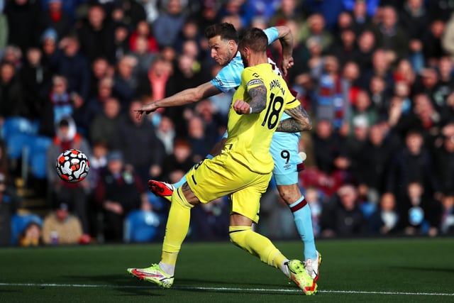 Chris Wood of Burnley scores their side's first goal during the Premier League match between Burnley and Brentford at Turf Moor on October 30, 2021 in Burnley, England.