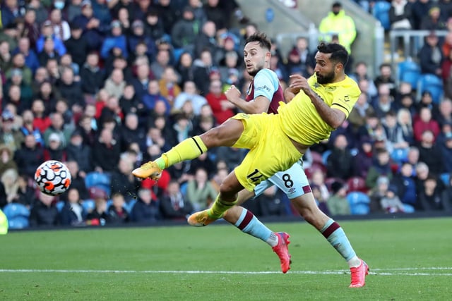 Saman Ghoddos of Brentford scores their team's first goal during the Premier League match between Burnley and Brentford at Turf Moor on October 30, 2021 in Burnley, England.