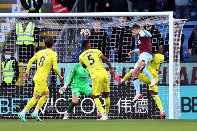 Matthew Lowton of Burnley scores their team's second goal during the Premier League match between Burnley and Brentford at Turf Moor on October 30, 2021 in Burnley, England.