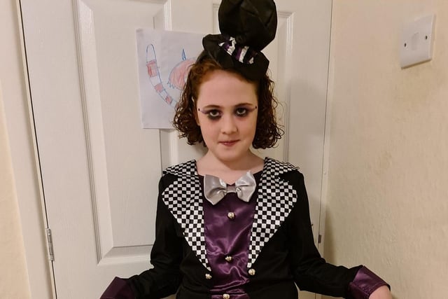 Cat Frances says "my 10-year-old daughter Charlotte is a spooky Mad Hatter (although she claims she is a ghost from Luigi's Mansion 3)"