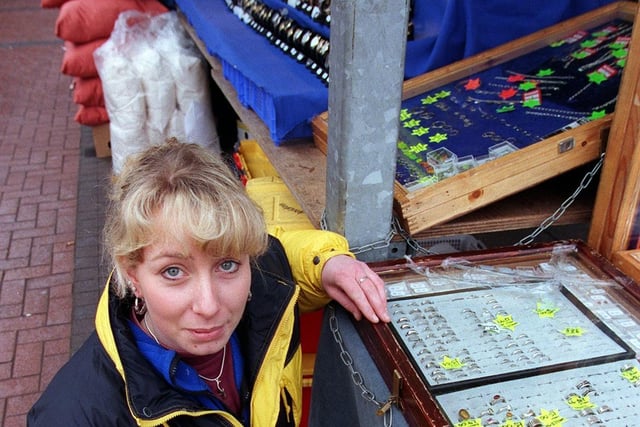 This is Paula Dwyer at her jewellery stall who was threatened with suspension in January 1999 as her table crossed a black line by an inch.