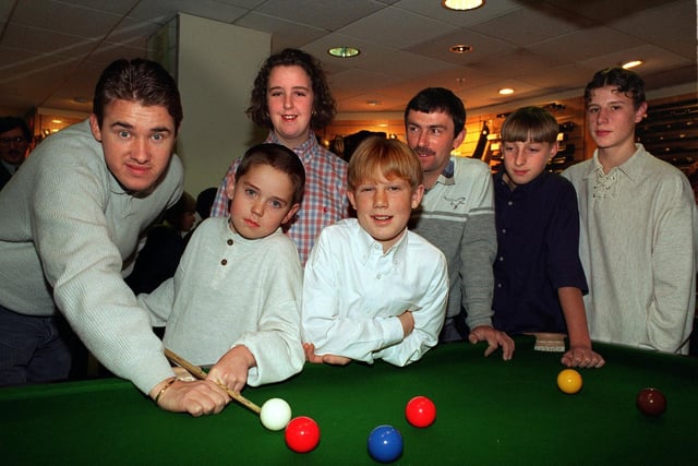 World snooker champion Stephen Hendry gives a few tips to YEP winners at Lillywhites sports store. Pictured, from left, are Aaron Fenton, Louise Howson, Matthew Hale, Stuart Pickup, Andrew Brown and Alister Smith,