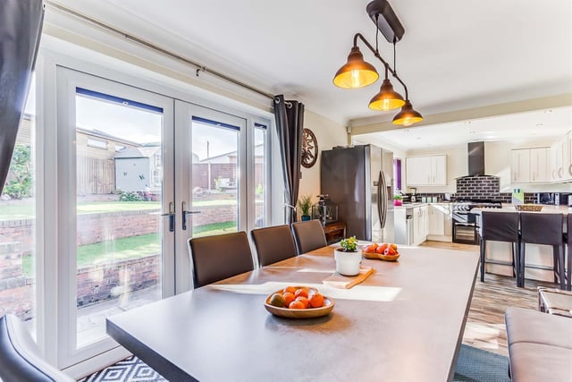 An open plan kitchen leads to this sizeable family space.