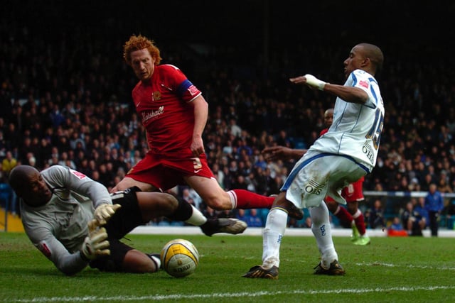 Fabian Delph sees his effort saved by MK Dons goalkeeper Willy Gueret in the final minutes of the League One clash at Elland Road in March 2009. The Whites won 2-0.
