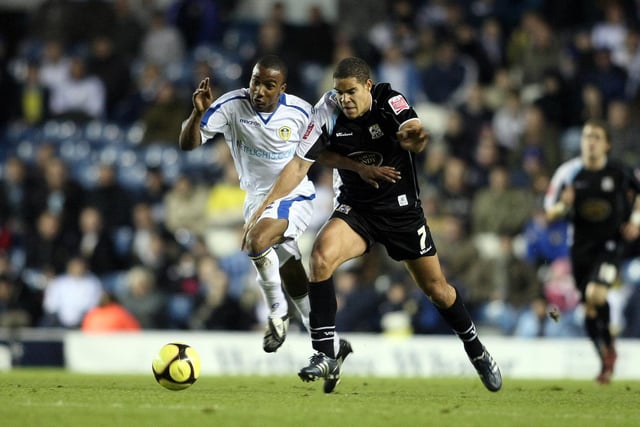 Fabian Delph battles for the ball with Northampton Town's Giles Coke during the FA Cup first round clash at Elland Road in November 2008.