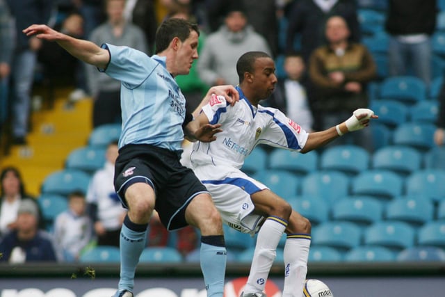 Fabian Delphs controls the ball under pressure during Leeds United's clash with Scunthorpe United at Elland Road in February 2009. The Whites won 3-2.