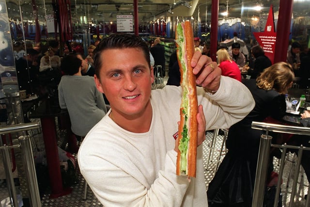 Yorkshire cricketer Darren Gough tries out a sandwiches in the new Pret-A-Manger shop on Bond Street in the city centre.