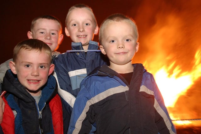 Reece Gilderdale, Liam Gilderdale, Daniel Whitehead and Cameron Whitehead enjoying Bonfire Night in 2004