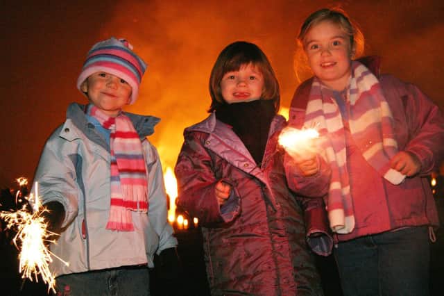 Megan Woodcock, Jessica Banks and Hanna Woodcock at the Mirfield Charity Bonfire in 2004