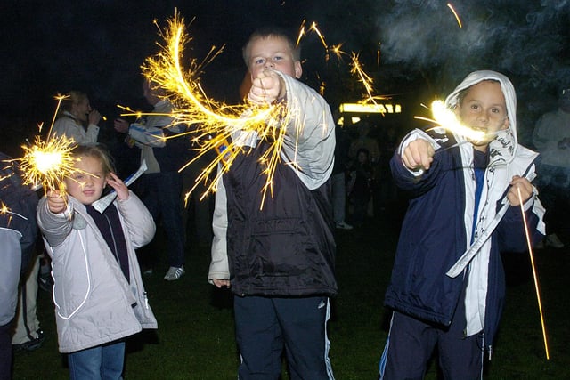 Blackpool Cricket Club Bonfire Night, 2004. A sparkling time for L-R: Summer Edwards, Andrew and Adam Shuttleworth