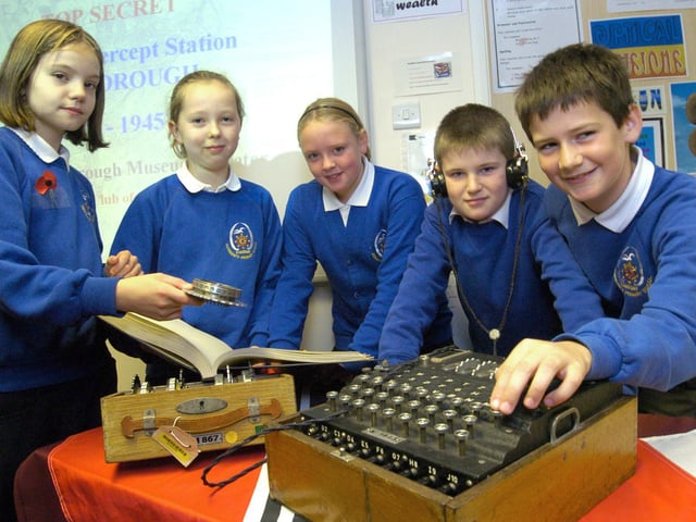 Children from Stakesby School get to see an actual Enigma machine.