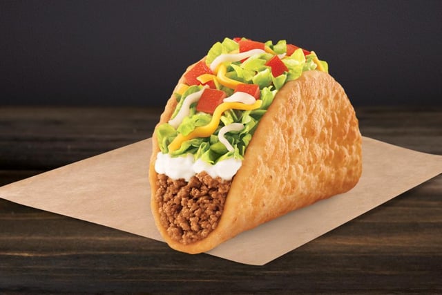 The chalupa supreme is a traditional Mexican flatbread, deep-fried to crispy perfection and filled with seasoned beef, a three-cheese blend, lettuce, tomatoes, and sour cream.