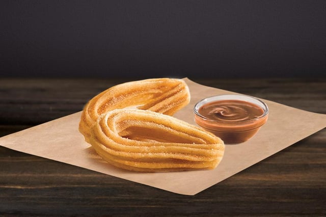 A churro is a type of fried dough from Spanish and Latin American cuisine, often served dipped in melted chocolate or indulgent dulce de leche. The churros you can find at Taco Bell may not match up to the ones you can usually buy at food festivals and Christmas markets - but they're 'simple, innocent, and delicious'.