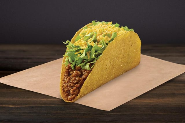 Let's start with the basics: the Taco Bell cruncy taco is a mainstay of the chain's saver menu, made up of its unique hard-shell taco (not traditionally seen in Mexico, where tacos are typically soft), seasoned beef, chicken or beans, lettuce, and cheese. What you see is what you get with this tried and true classic.
