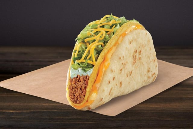 This item ranks among Taco Bell's most popular offerings. A hard taco shell filled with seasoned beef, chicken or beans is wrapped in a soft flatbread, with a layer of oozy cheese in between.