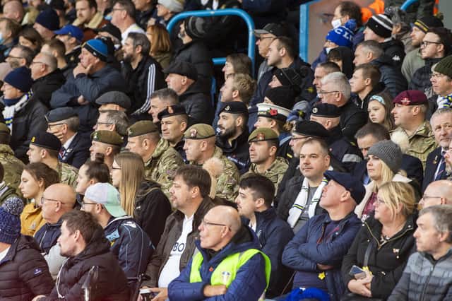 Armed Forces sit among Leeds United fans inside Elland Road on Saturday during the Whites' clash with Leicester City.