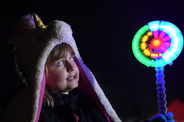 Jessica Semlzuk (aged 6) enjoying the bonfire with her spinning wheel