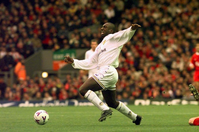 Jimmy Floyd Hasselbaink is brought down by Liverpool's Jamie Carragher.