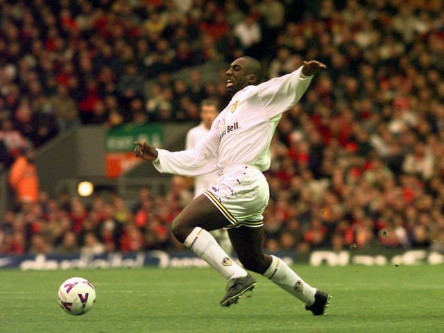 Jimmy Floyd Hasselbaink is brought down by Liverpool's Jamie Carragher.